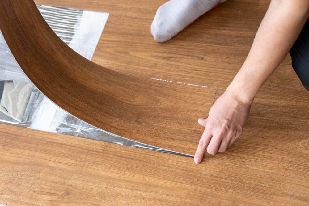 type of adhesive for vinyl floors